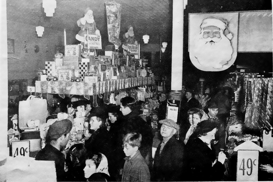 Christmas shopping at S.S. Kresge’s on Elm Street in a photo that ran in the INCO Triangle in December, 1948.