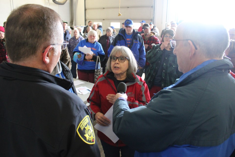 Beaver Lake resident Linda  Heron asks a question during a recent public consultation meeting regarding proposed changes to emergency services infrastructure.