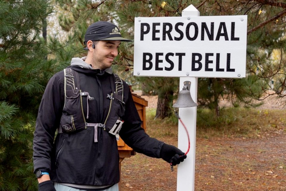 Sudbury runner Michael Rouleau ran 167.65 kilometres to win Greater Sudbury’s first-ever Backyard Ultra marathon. Here he is ringing the personal best bell.