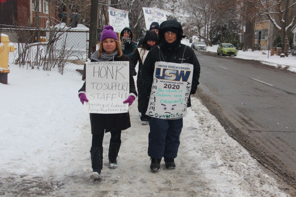 A dozen employees of Sudbury Counselling Services have been on strike for almost two months. They're seen here on the picket lines Dec. 8. (Heidi Ulrichsen/Sudbury.com)
