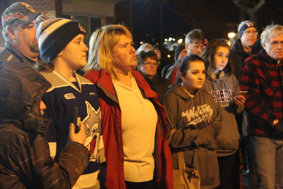 The crowd was solemn at a Sunday night vigil outside the Sudbury Arena in solidarity with those affected by the Humboldt Broncos tragedy. (Heidi Ulrichsen/Sudbury.com)