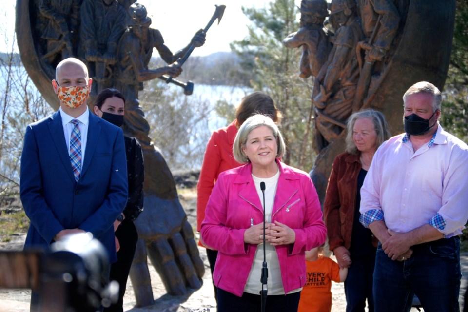 Flanked by Northern Ontario candidates and a Labour Council representative, Ontario NDP Leader Andrea Horwath speaks during a media conference at Bell Park earlier today, at which she announced the party’s Northern Ontario platform.
