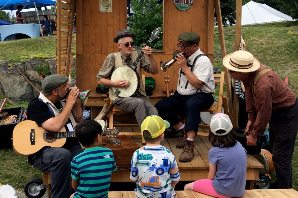 Paul Loewenberg along with Sheesham Lotus & 'Son, providing “good old” folk music to the younger generation.