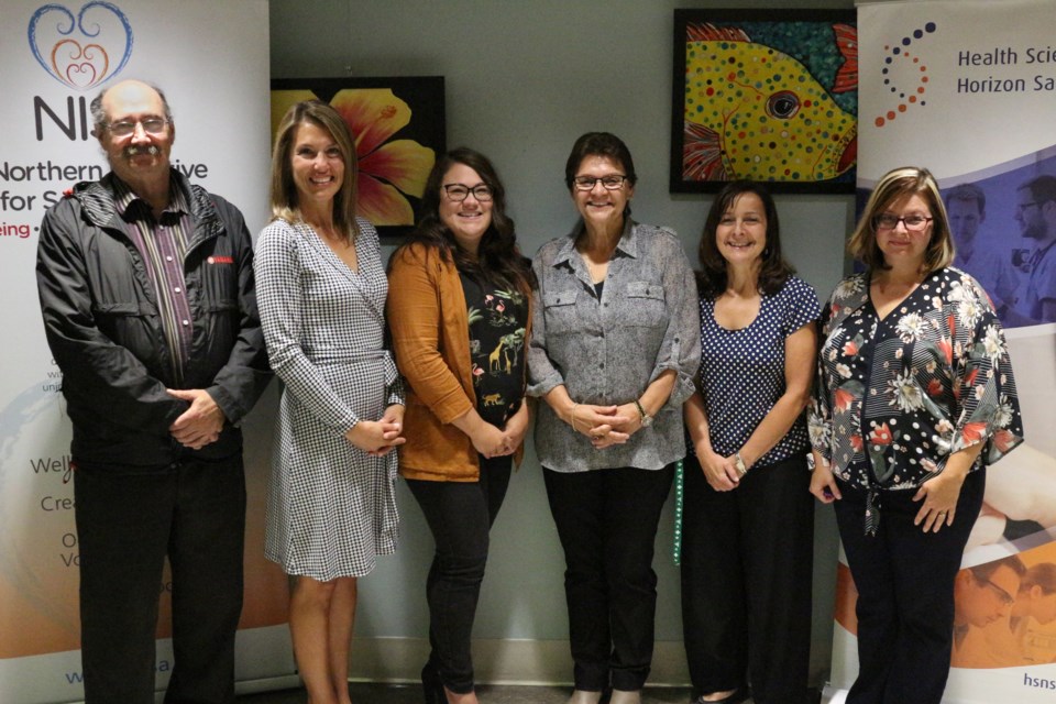 (From the left) Joel Johnson, Stephanie Paquette, Chelsea Gauthier, Claudie Doiron, Crystal Pitfield and Dinah Laprairie, at the announcement of Health Sciences' North adoption of the Peer Navigator program. (Keira Ferguson/ Sudbury.com)