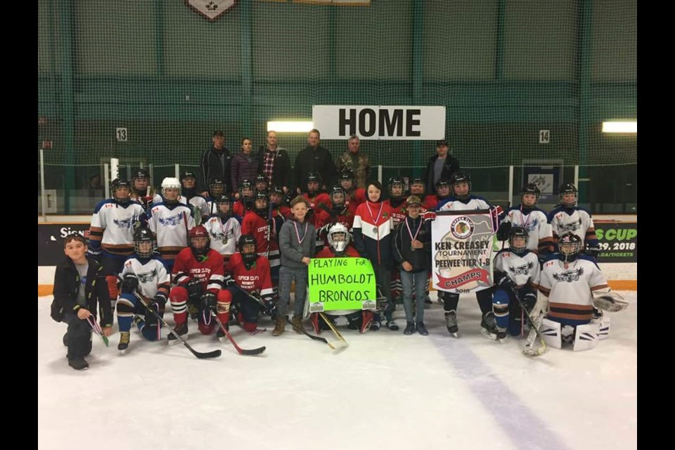After their silver-medal win at the Ken Creasey Tournament, the Copper Cliff Eagles pee wee hockey team honoured the Humboldt Broncos. (Supplied)