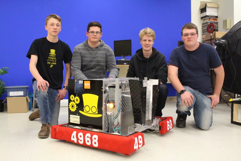 Lively robotics team members (L to R) Keaton Broomhead, Ryley Ongarato, Scott Foy, and Christian Cox. (Matt Durnan)