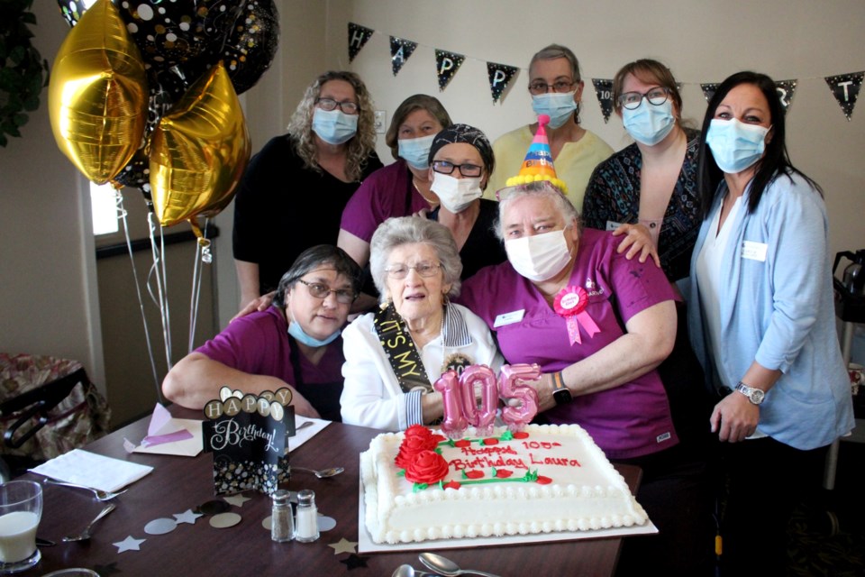 Resident Laura Belanger (front centre) is seen here celebrating her 105th birthday with staff members at the Chartwell Westmount on William Retirement Residence in New Sudbury. From left are staff members Louise Proulx, Jackie Rennie, Carmen Brisson, Angie O'Neill, Helene St. Germain, Karryna Spencer, Carole Goulard and Louise LaRue.