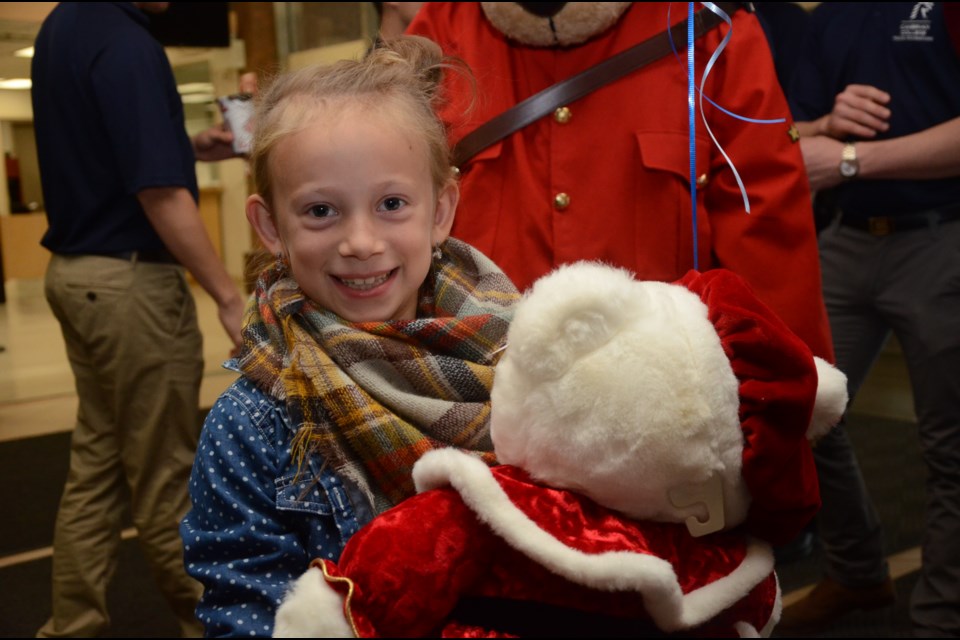 Kylee Jewers, a  Grade 3 student at Ecole Alliance St-Joseph in Chelmsford, fought and beat cancer. She was a special guest at the launch of the Teddy Bear Picnic Auction at Cambrian College. Photo by Arron Pickard.