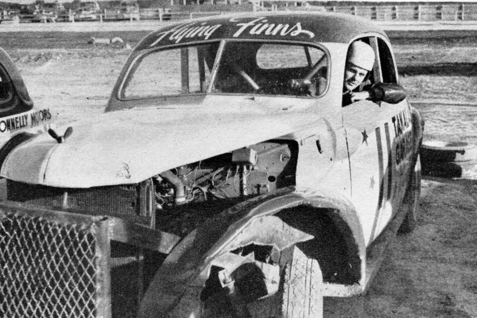 Famed local racer Elmer Tuuri smiles for the camera while at the wheel of No. 11, the Flying Finns, at Sudbury Speedway in 1952. 
