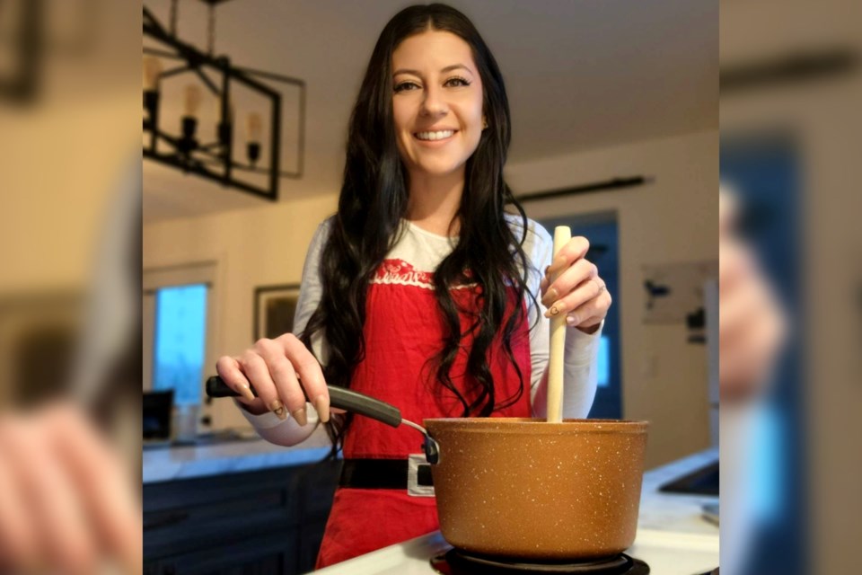 Genevieve Richer prepares to melt toffee and chocolate on saltine crackers at her home in Warren, east of Sudbury. She has been making Christmas crack for the past six years and plans to sell her addictive and crunchy sugary treat to locals next season. 