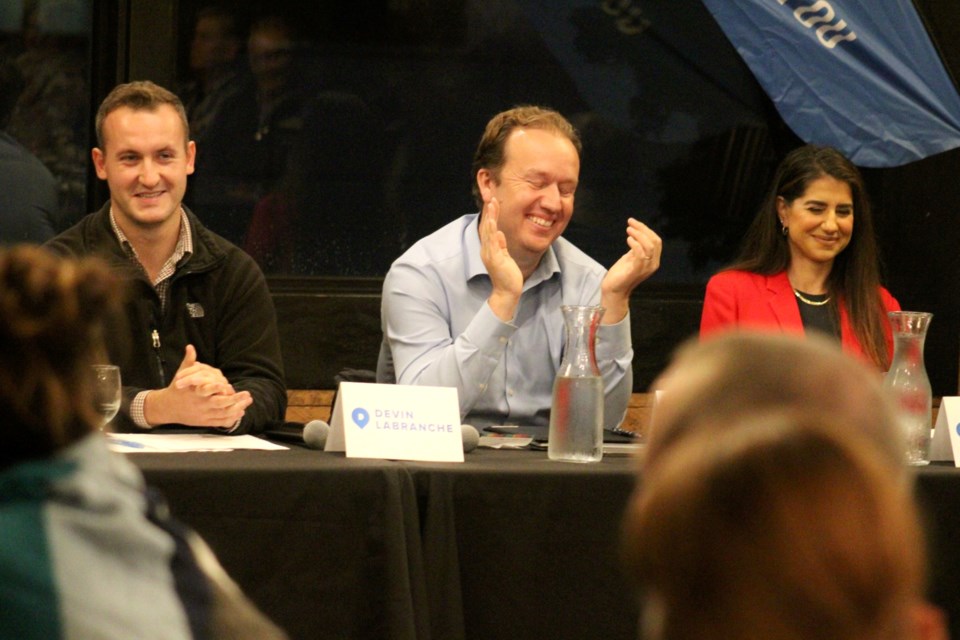 Mayoral candidates Devin Labranche, Paul Lefebvre and Miranda Rocca-Circelli share a laugh during a “Mayoral Candidates Meet and Greet” event hosted by Downtown Sudbury BIA at Durham Hall on Wednesday.