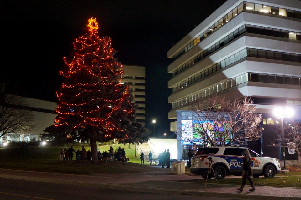 Warmed by a sacred fire and impassioned by the beating of the drums, around 50 people gathered in the shadow of a large coniferous tree on the grounds of the Greater Sudbury Police Service on Nov. 13 for the second annual Tree of Hope lighting ceremony.