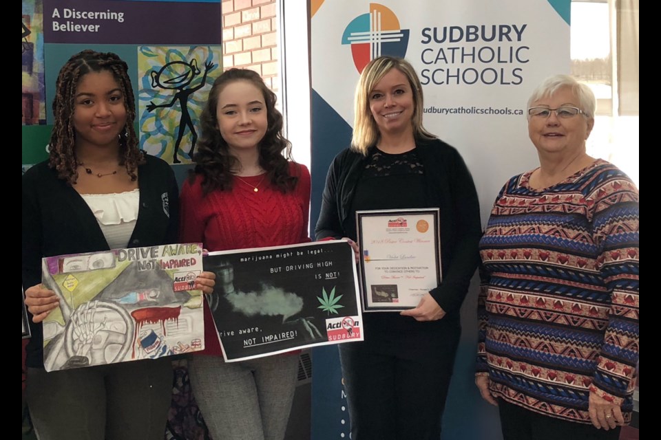 From left are St. Charles College students Kyra Coutain and Violet Landrie, teacher Christina Thompson and Action Sudbury representative Mary Roy. (Supplied)
