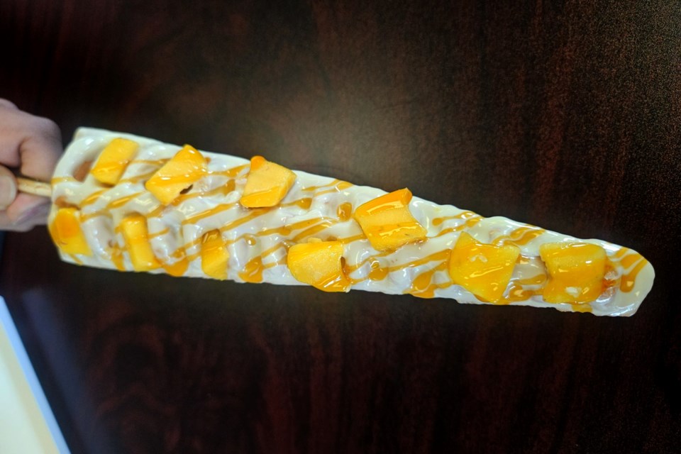 Meet the Mango Mania Waffle Stick. This premium roll ice cream packs a fruity punch. It can be rolled, pocked or displayed on a waffle stick. 