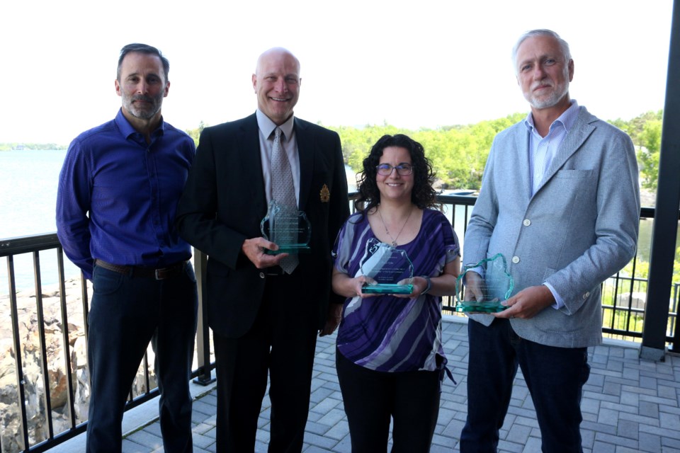 Our Children, Our Futures announced a new group of Champions for Children during a luncheon held at the Northern Water Sports Centre on June 14. Pictured left to right are honorary chair John Whitehead, Sudbury Food Bank chair of board of directors and Greater Sudbury Police Chief Paul Pedersen, Maria Vaillancourt on behalf of Dr. Paul Kyle's office, and Delta Bingo and Gaming general manager Denis Sivret. (Heather Green-Oliver/Sudbury.com)