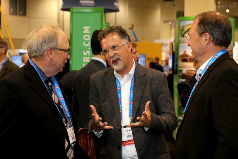 At PDAC 2022, David Jones of Drillco, North Bay, chatting with Temiskaming Shores mayor Carman Kidd and North Bay Mayor Al McDonald.