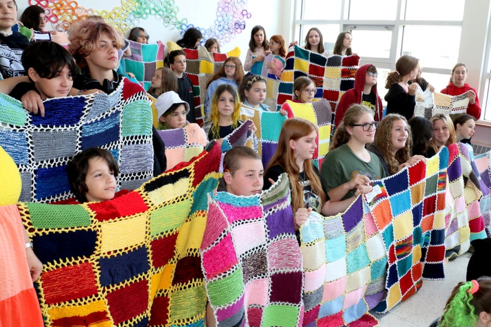Roughly 60 students at Chelmsford Valley District Composite School took part in the knitting program, which saw the student create blankets for people undergoing cancer treatment at the Northeast Cancer Centre.