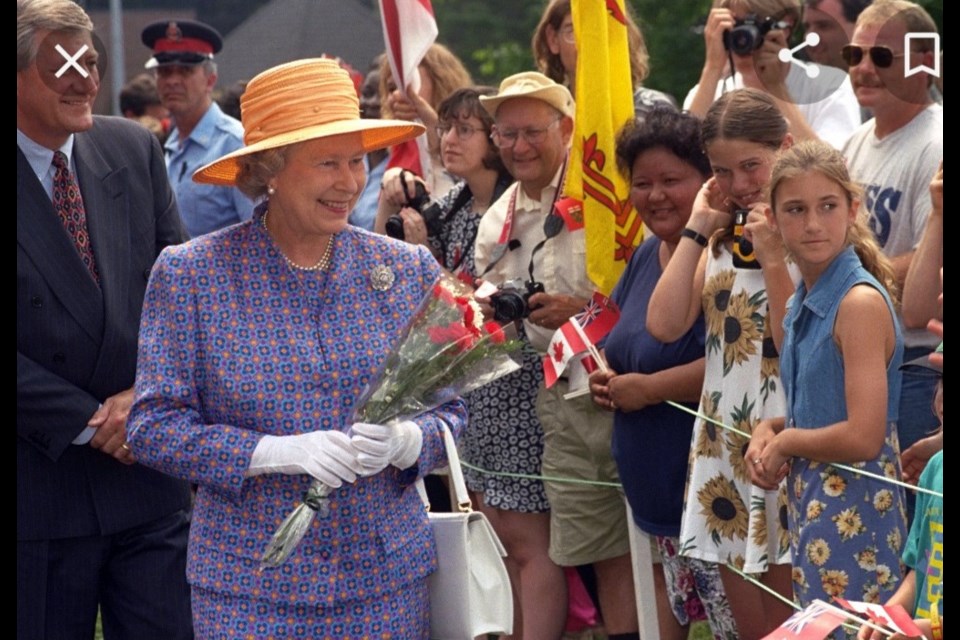 Queen Elizabeth during the Royal visit to North Bay in 1997 as part of her trip to celebrate the 500th anniversary of John Cabot's arrival in North America. Then Premier Mike Harris can be seen in the background. (Image: Tammy Stevens)