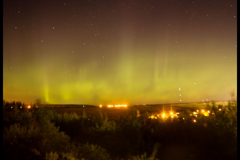 When Matthew Barton was tipped off by a friend that the northern lights were dancing over Sudbury last night, he jumped in his car and headed to the Big Nickel, and snapped these photos. Photo by Matthew Barton.
