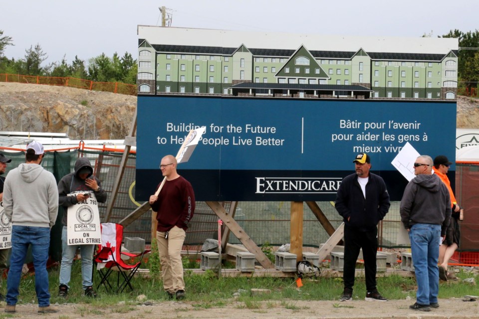 A strike by members of the International Union of Operating Engineers (IUOE) in Ontario has halted construction work on the new Extendicare nursing home on Algonquin Road in Sudbury. Pictured are workers on the picket line on May 16.