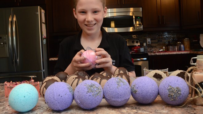 Will Kilbride shows off a selection of his bath bombs, soaps and scrubs that he sells through Soaps for Sudbury, with all profits going to Maison McCulloch Hospice. (Arron Pickard/Sudbury.com)