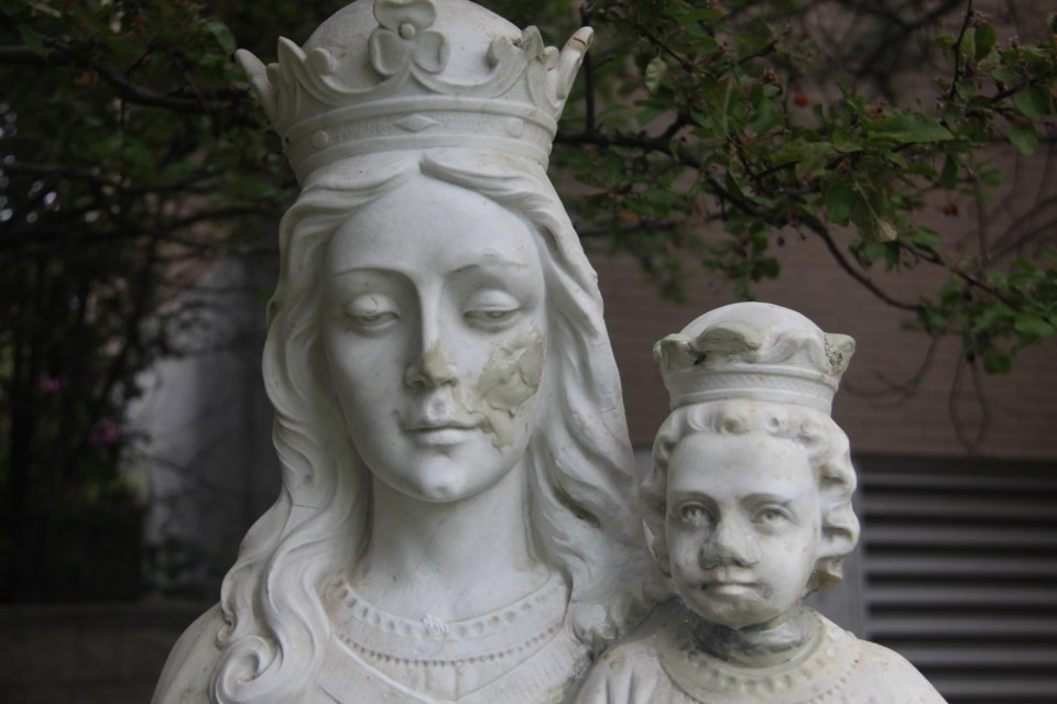 The head of baby Jesus on a statue at Ste-Anne-des-Pins church in downtown Sudbury that became the centre of an international media frenzy last fall has been reattached to the statue. (Heidi Ulrichsen/Sudbury.com)