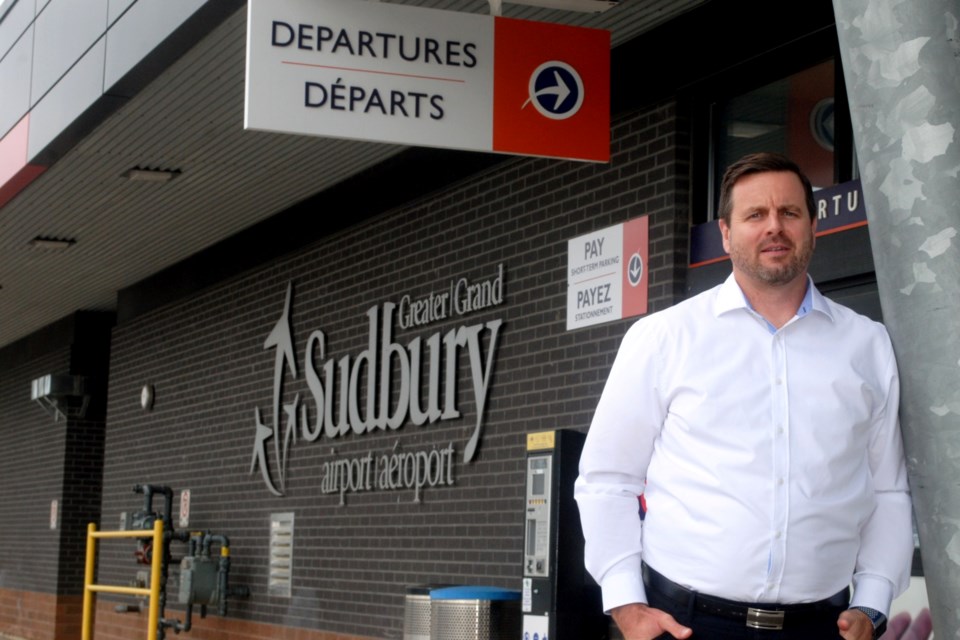 Jean-Mathieu Chénier, the marketing director at the Greater Sudbury Airport, is seen outside of the terminal.