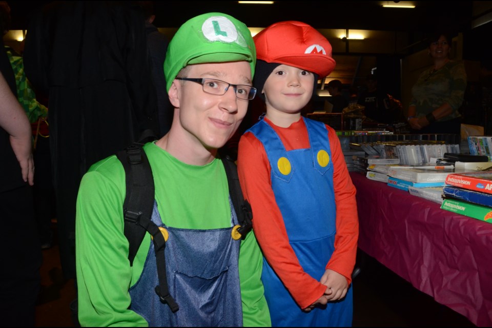 Terran Bainard and Korbyn Bainard, 6, dressed the part of Mario and Luigi for the Northern Game Expo. Photo by Arron Pickard.