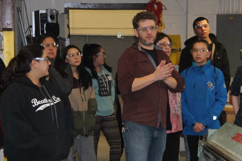 Sean Perras, technician for Cambrian College's heating, ventilation and air conditioning program, speaks to First Nations, Métis and Inuit students Feb. 15 as part of a seminar put on by Skills Ontario. Photo by Heidi Ulrichsen.