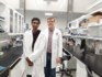 Aaryan Harshith, at left, has developed a device that he said can detect cancer cells far more quickly than any conventional device. Harshith, who is 14, moved from the Ottawa area with his parents this summer and will soon be attending Grade 10 in Sudbury. In this photo he was with Dr. Martin Holcik of Carleton University. (Photo Supplied) 