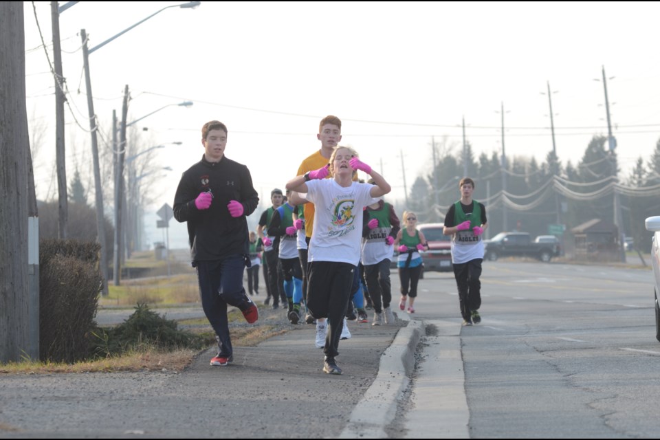 More than 100 students from five high schools joined Greater Sudbury Police Service in the five-kilometre Courage to Stand Run on Friday. The run ended at the Howard Armstrong Centre, where they were treated to pizza and refreshments. Photo by Arron Pickard