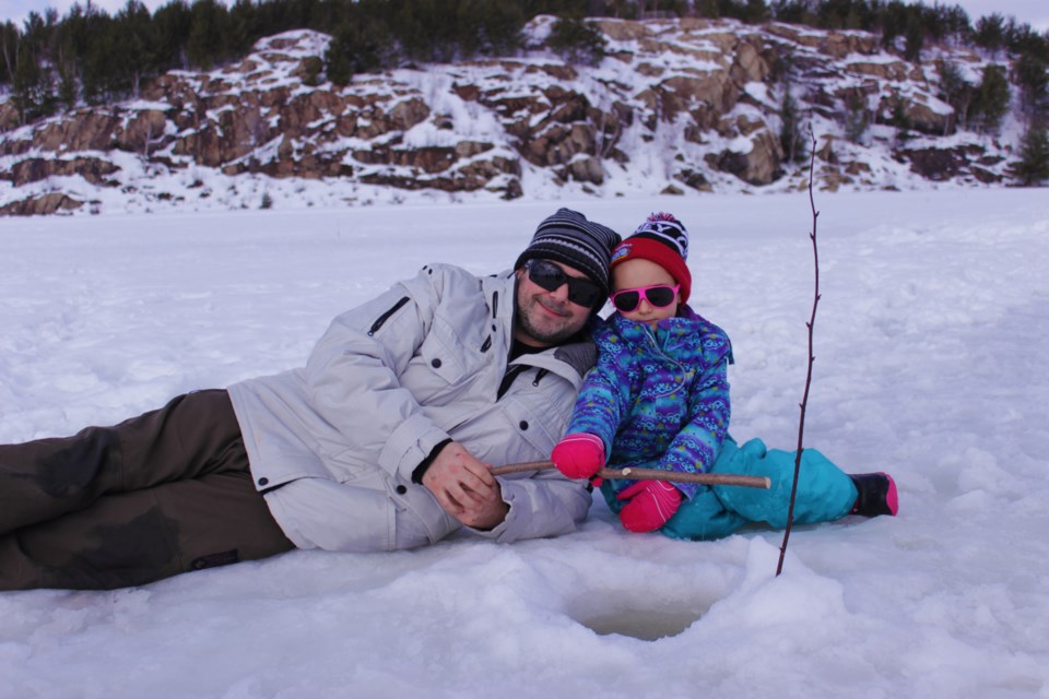 Families flocked to the Lake Laurentian Conservation Area for the fifth annual Friends and Family Ice Fishing Day on Sunday. Photo by Callam Rodya.