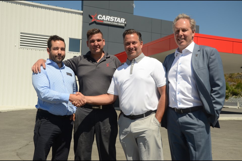 Celebrating the grand opening of Sudbury's CarStar location on July 19 was, from left, Steve Primeau, manager, Phil Chartrand, shop manager, Vince Palladino, co-owner, and Vince Pollesel, co-owner. (Arron Pickard) 
