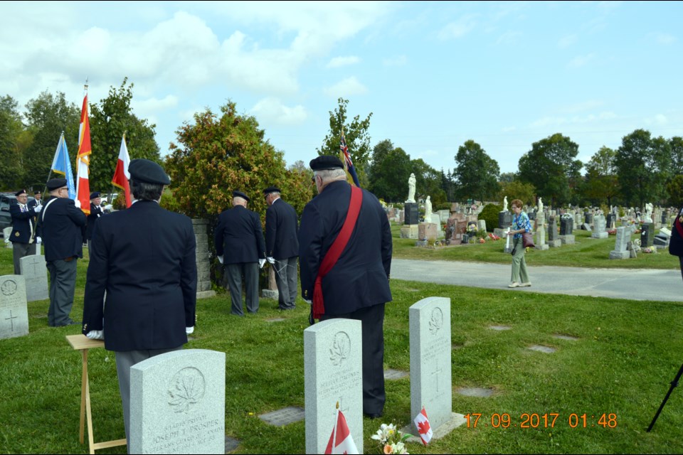  Legionnaires lay wreaths at Lasalle Cemetery as part of the Sept. 17 Decoration Day services. (Gisele Pharand/Legion Br. 76)