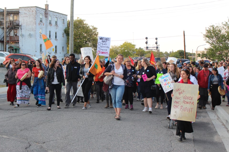 The Take Back the Night march winds through downtown Sudbury Sept. 19. (Matt Durnan/Sudbury.com)
