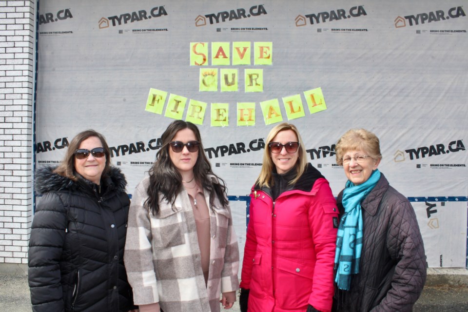 Skead residents advocating for the Skead fire station gather outside the building on Monday. From left is Nicole Everest, Karleigh Farnel, Holly Baril and Rose Rice. 