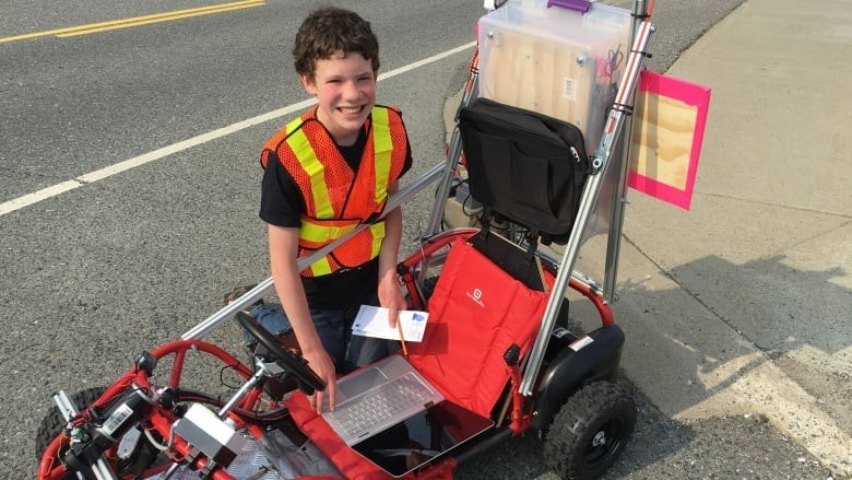Brendon Matusch, seen here with his self-driving go cart, has now won an international science fair for the project. (Supplied)
