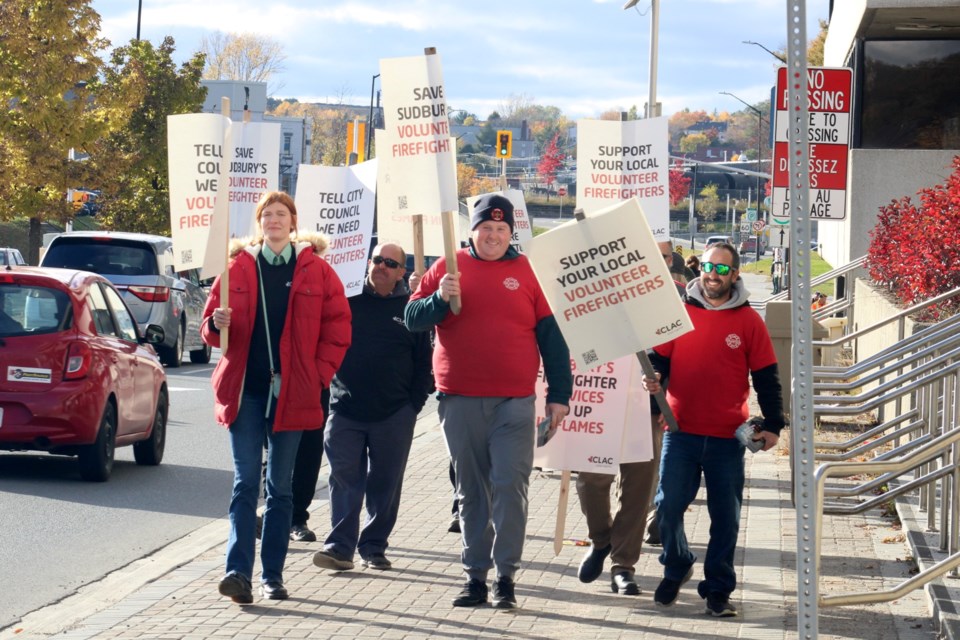 Christian Labour Association of Canada Local 920 members and their supporters picket outside of Tom Davies Square on Thursday to protest the city’s handling of collective bargaining with volunteer firefighters as well as how they’re rolling out provincially mandated training requirements.