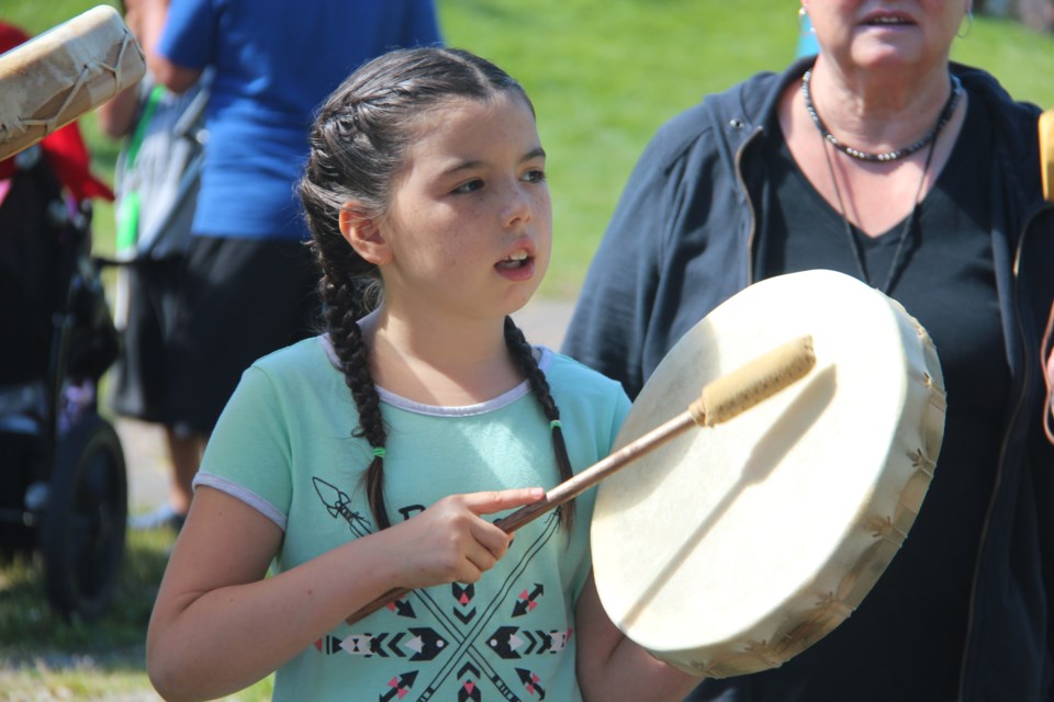 Children participated in a drumming circle at National Aboriginal Day celebrations taking place in O'Connor Park June 21. There's also events in celebration of National Aboriginal Day going on at Grace Hartman Amphitheatre starting at noon today and Sudbury Theatre Centre starting at 6 p.m. (Heidi Ulrichsen/Sudbury.com)