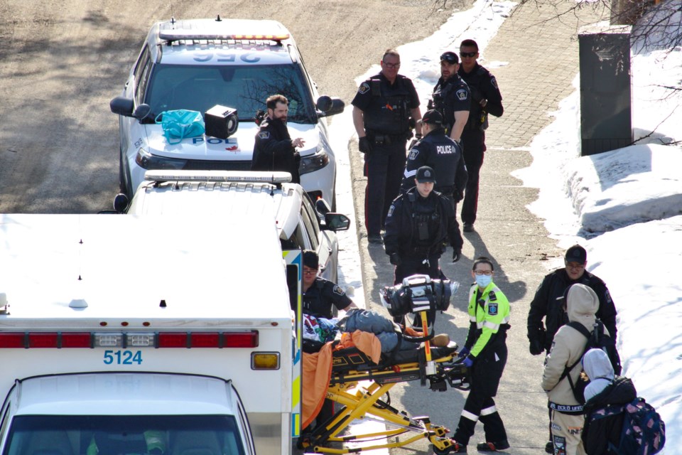The morning of March 22, Greater Sudbury Police arrested a third suspect in relation to a violent robbery that occurred March 21. Officers report the suspect was experiencing a medical emergency when they tracked him down and paramedics were called to transport the man to hospital.