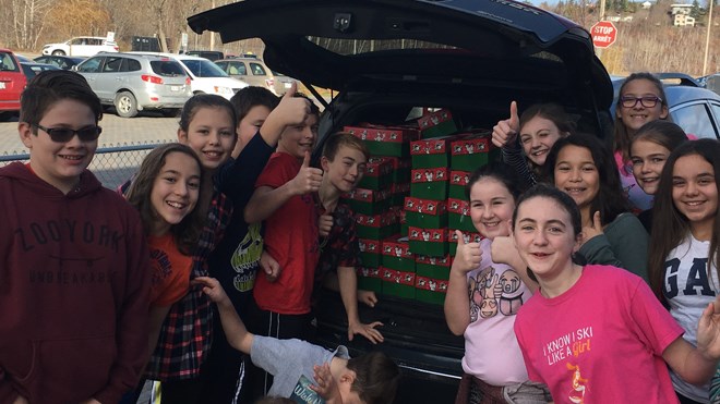 Students and staff at Sudbury’s École St-Denis recently celebrated the success of the school’s Christmas Child Drive. The school put together close to 150 boxes consisting of various articles for children living in developing countries. Supplied photo