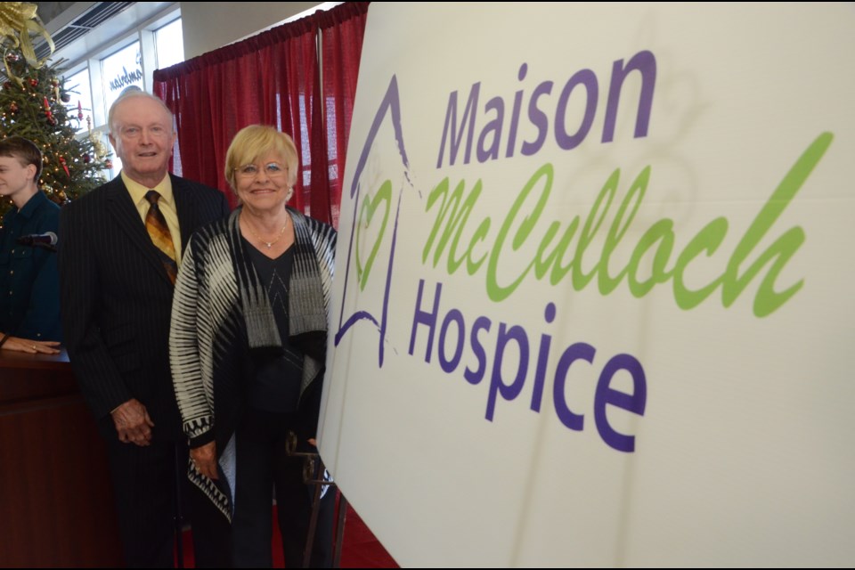 Bruce and Sandra McCulloch show off the new name of the hospice: Maison McCulloch Hospice. The family donated $1 million towards the facility future expansion. Photo by Arron Pickard
