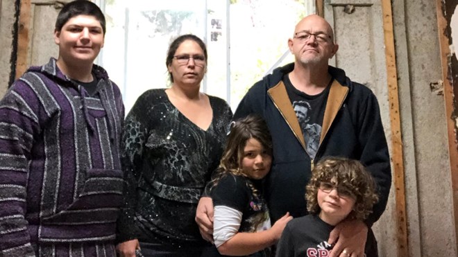 Richard Howard and Rachel Legault and their children are currently living in a hotel, and they have been for seven months, as their insurance company and contractors are “dragging” their feet on repairs. (Supplied)