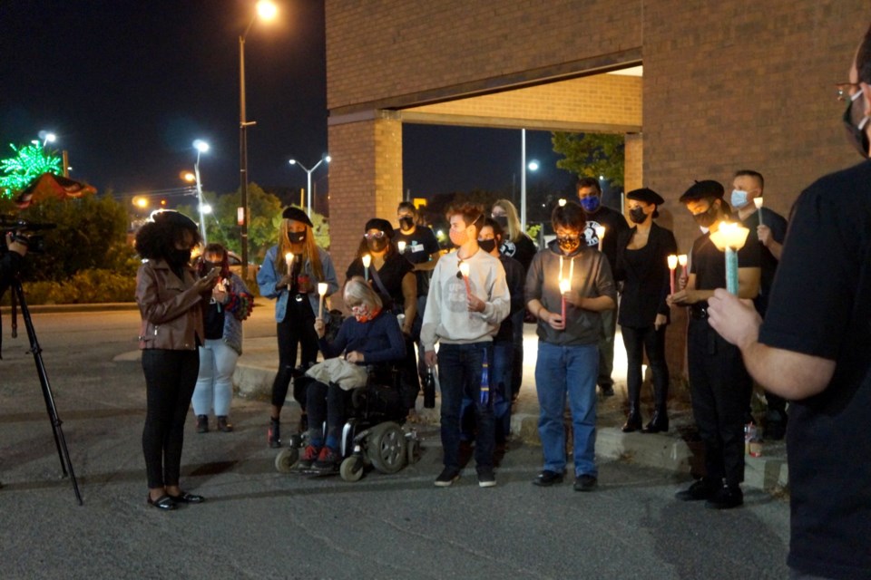 Following a viewing party and Q&A session on Tuesday night, Black Lives Matter Sudbury members and supporters hold a candlelight vigil outside Sudbury Theatre Centre. (Jenny Lamothe/Sudbury.com)