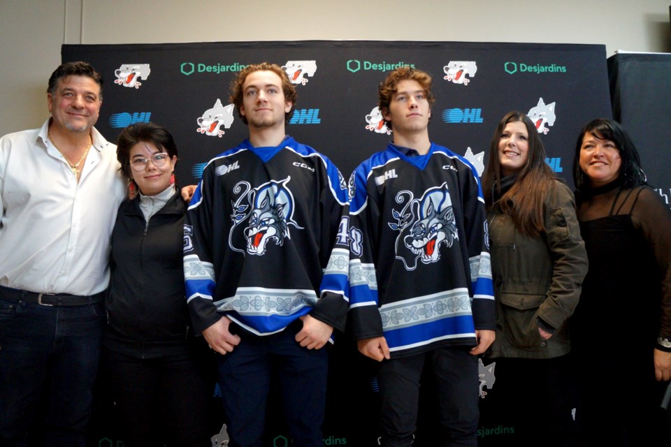 On hand for the Sudbury Wolves Indigenous Night jersey reveal are (from left) Dario Zulich, Sudbury Wolves owner, stands next to artist Raven Debassige, Wolves players Ethan Larman and David Goyette, and Shkagamik Kwe’s Melanie Laquerre and Angela Recollet. 