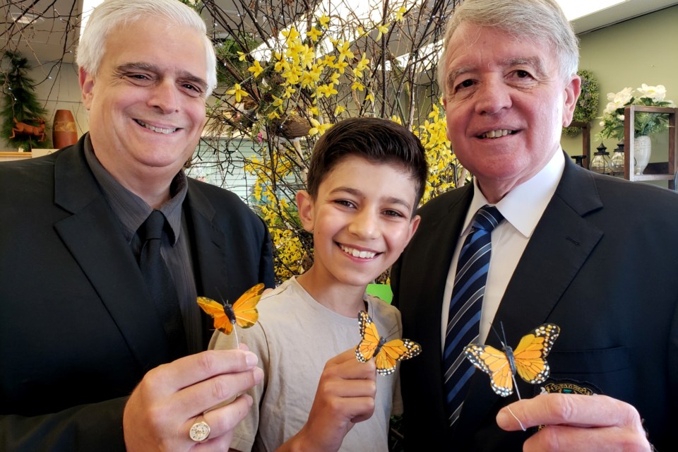 Brothers Geoffrey (left) and Gerry Lougheed Jr. with Gerry Lougheed’s grandson, Kiran. The Maison McCulloch Hospice live butterfly release event will be held Aug. 7 on the grounds of Science North.