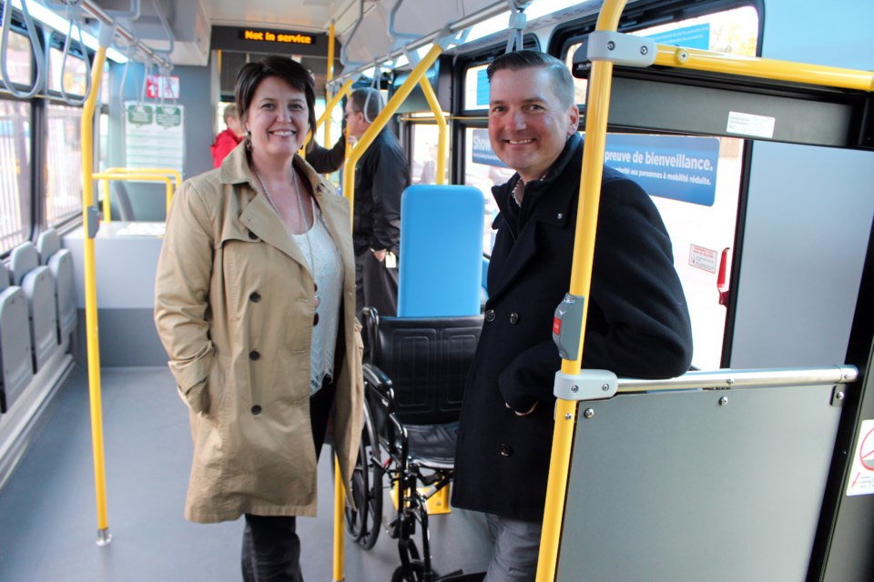 Michelle Ferrigan, Director of Transit Services and Paul Schweyer, Project Manager of Transit Services for Greater Sudbury inside one of three brand new accessible buses in the city. The buses were unveiled on October 25, 2018. (Allana McDougall/Sudbury.com)  
