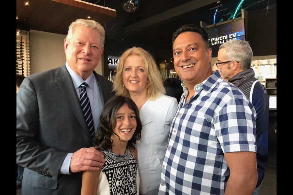 Vice President Al Gore poses with author Cathy Orlando, Sanjiv Mathur, and their daughter Sophia Mathur. (Cathy Orlando)