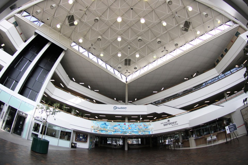 The atrium at Tom Davies Square is seen through the lens of a fish eye camera. The building is proposed to house a new central library and art gallery, with various municipal staff offices projected to shift into the building to its immediate north (199 Larch St.), which the city also owns.