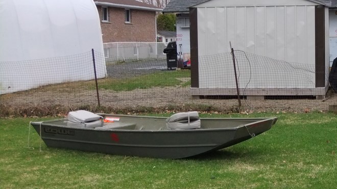 Gerry LaRocque of Azilda shared these images with Sudbury.com of his neighbour's boat, which Thursday's storm deposited in his backyard. (Gerry LaRocque)